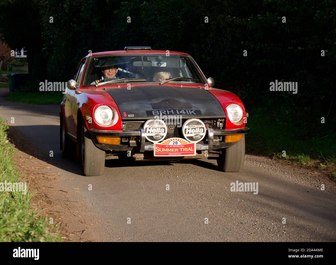 Rally Driving into the evening sun in a Datsun 240Z Stock Photo