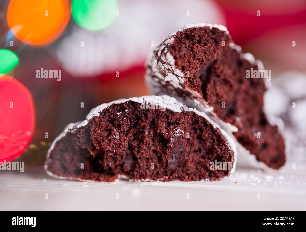 Homemade chocolate biscuits close-up. New Year's cookies, lights, bumps ...