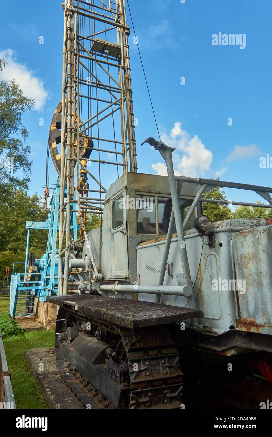 Wietze, Germany, September 10., 2020: Tracked drilling rig with mounted drilling tower for exploratory drilling Stock Photo