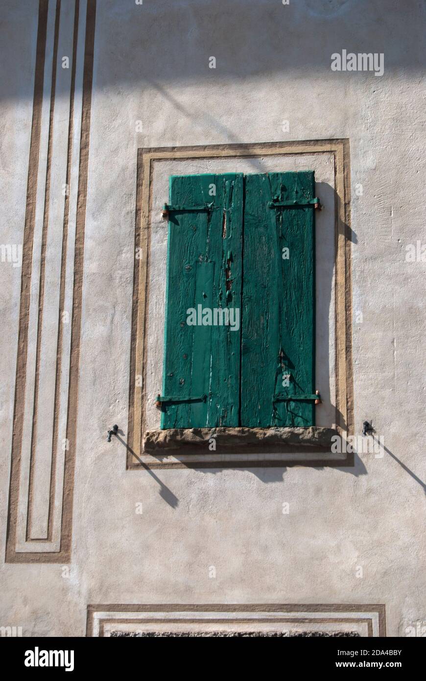 Old retro vintage house window with closed wooden green shutters Stock ...