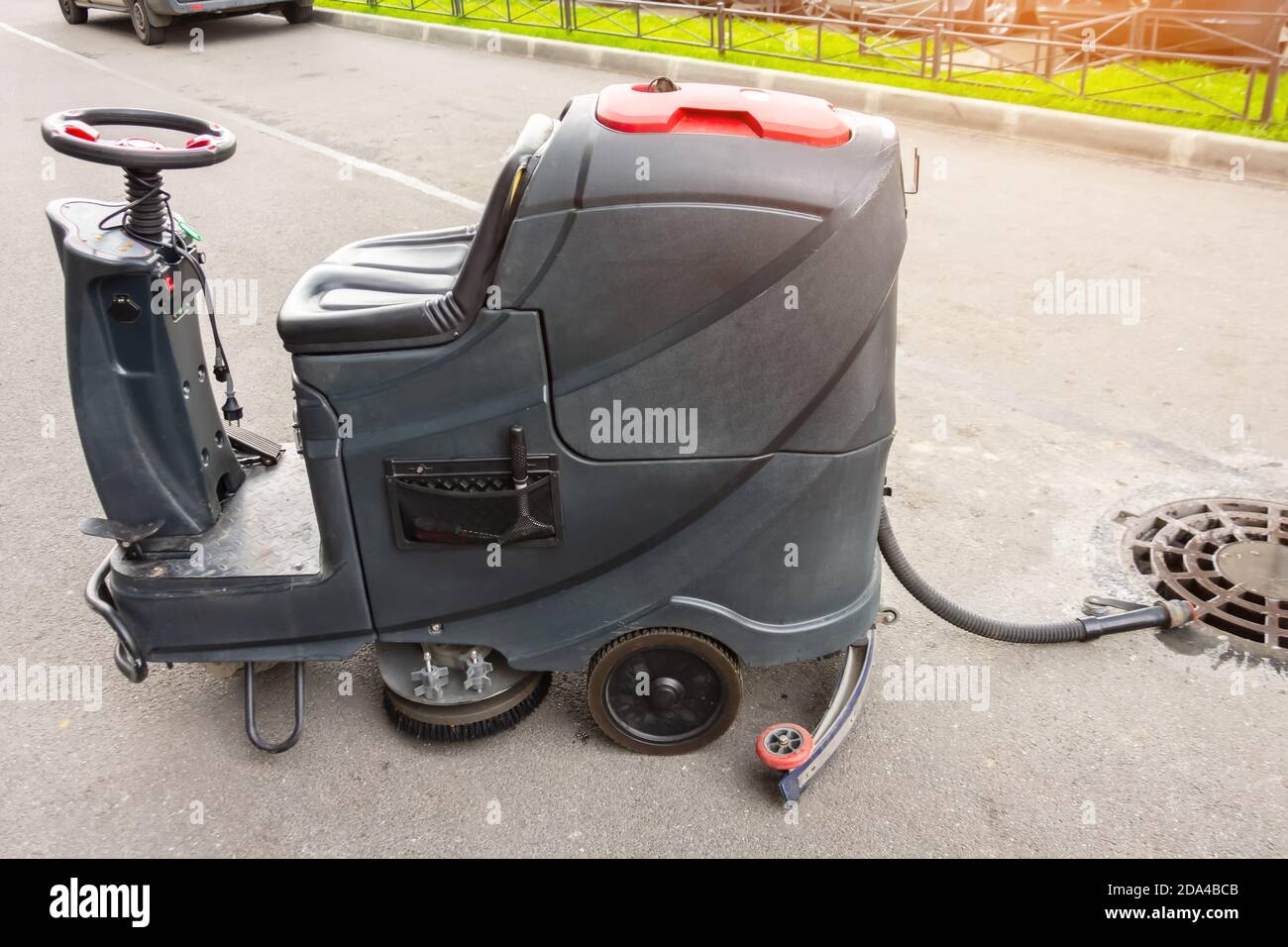 Floor care and cleaning services with professional washing machine the outside of the building