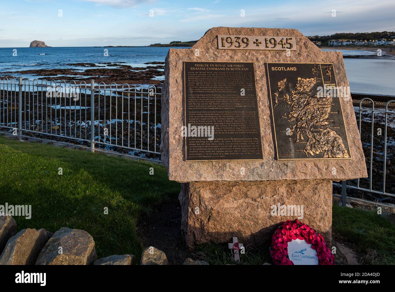 Memorial to RAF coastal defence command during world war II with poppy wreath, North Berwick, East Lothian, Scotland, UK Stock Photo