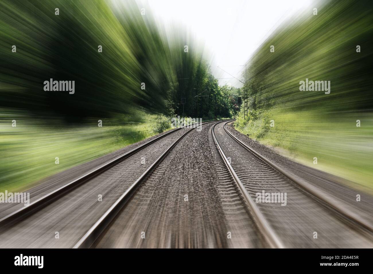 https://c8.alamy.com/comp/2DA4E5R/double-track-railroad-railway-or-train-tracks-with-speed-motion-blur-fast-travel-concept-background-with-copy-space-2DA4E5R.jpg