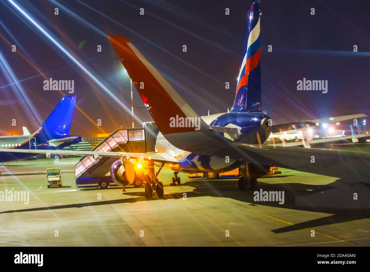 loading passenger aircraft at the airport before departure Stock Photo