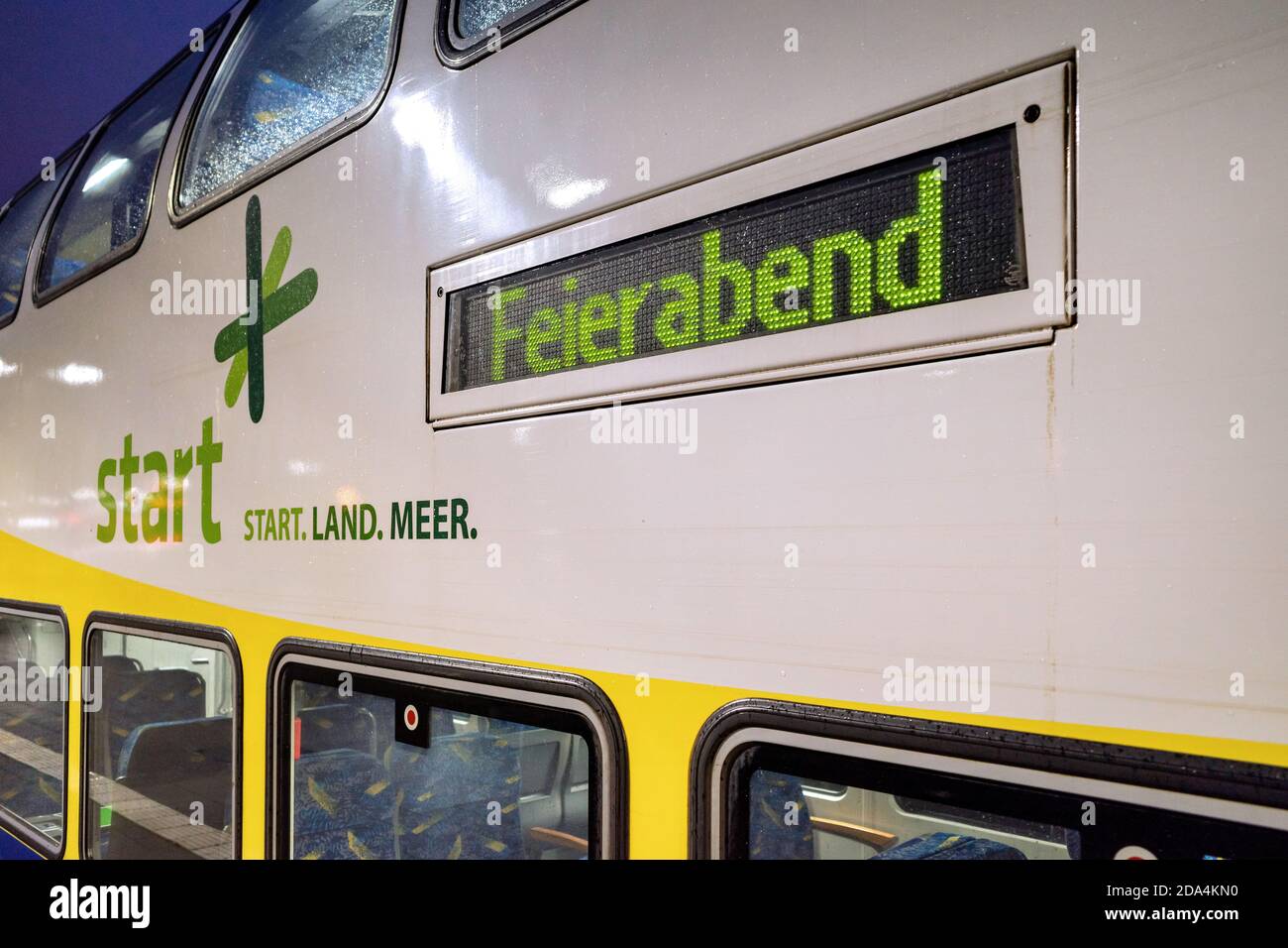 Start regional train with destination ‘Feierabend’ (‘home time’) at Cuxhaven railway station. Stock Photo