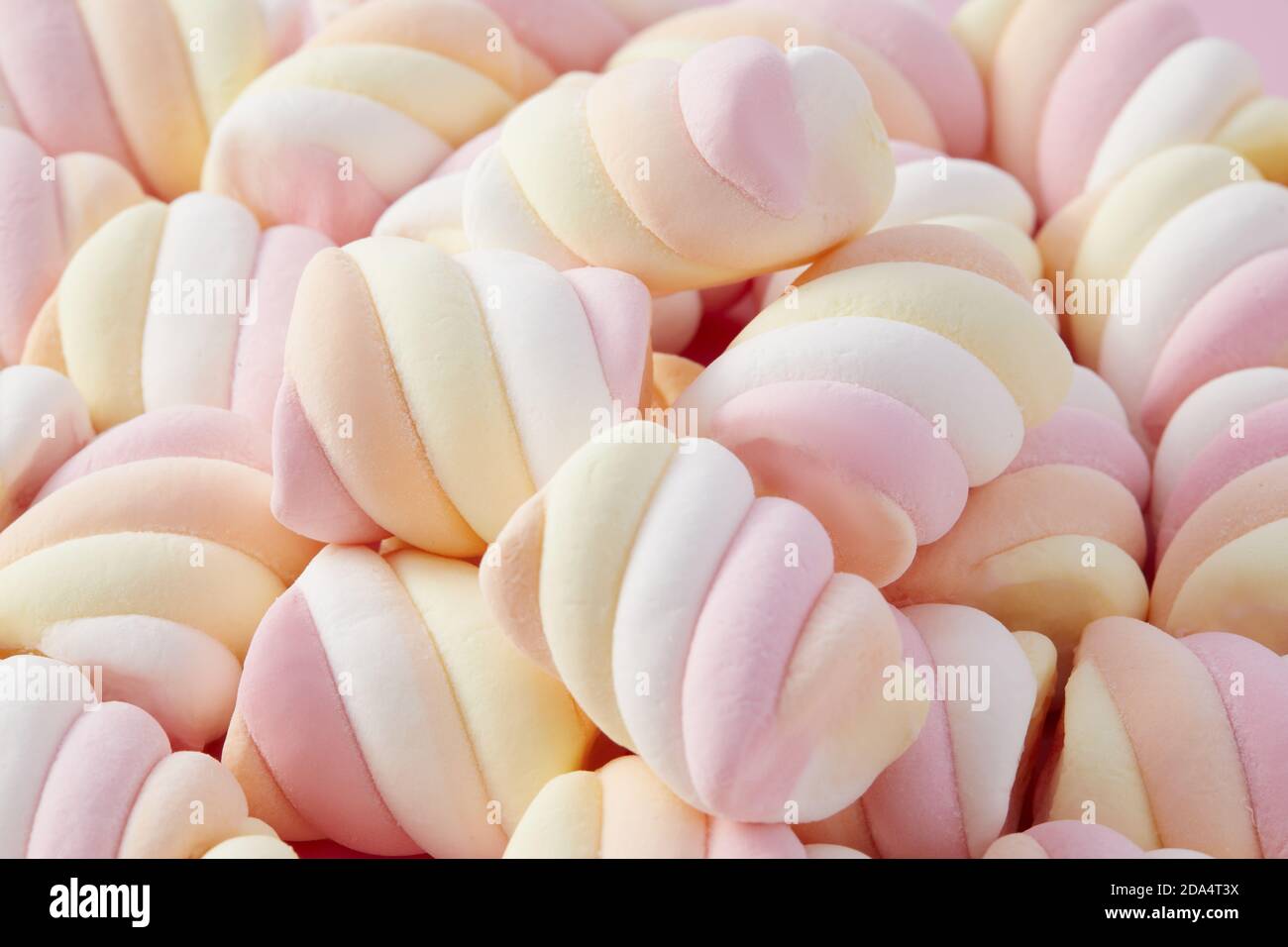 Detailed closeup of colorful white, pink and yellow marshmallows Stock  Photo - Alamy