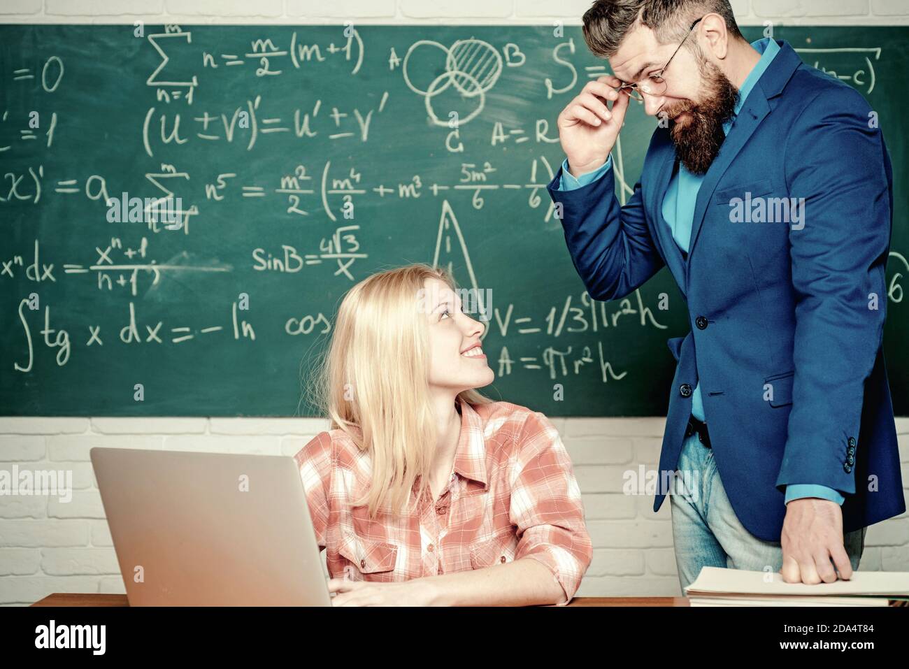 Nerd funny student preparing for university exams. Students campus education knowledge concept. Bearded tutor helping his student. Preparing for exam Stock Photo - Alamy Nerd funny student preparing for university exams. Students campus education knowledge concept. Bearded tutor helping his student. Preparing for exam Stock Photo - Alamy