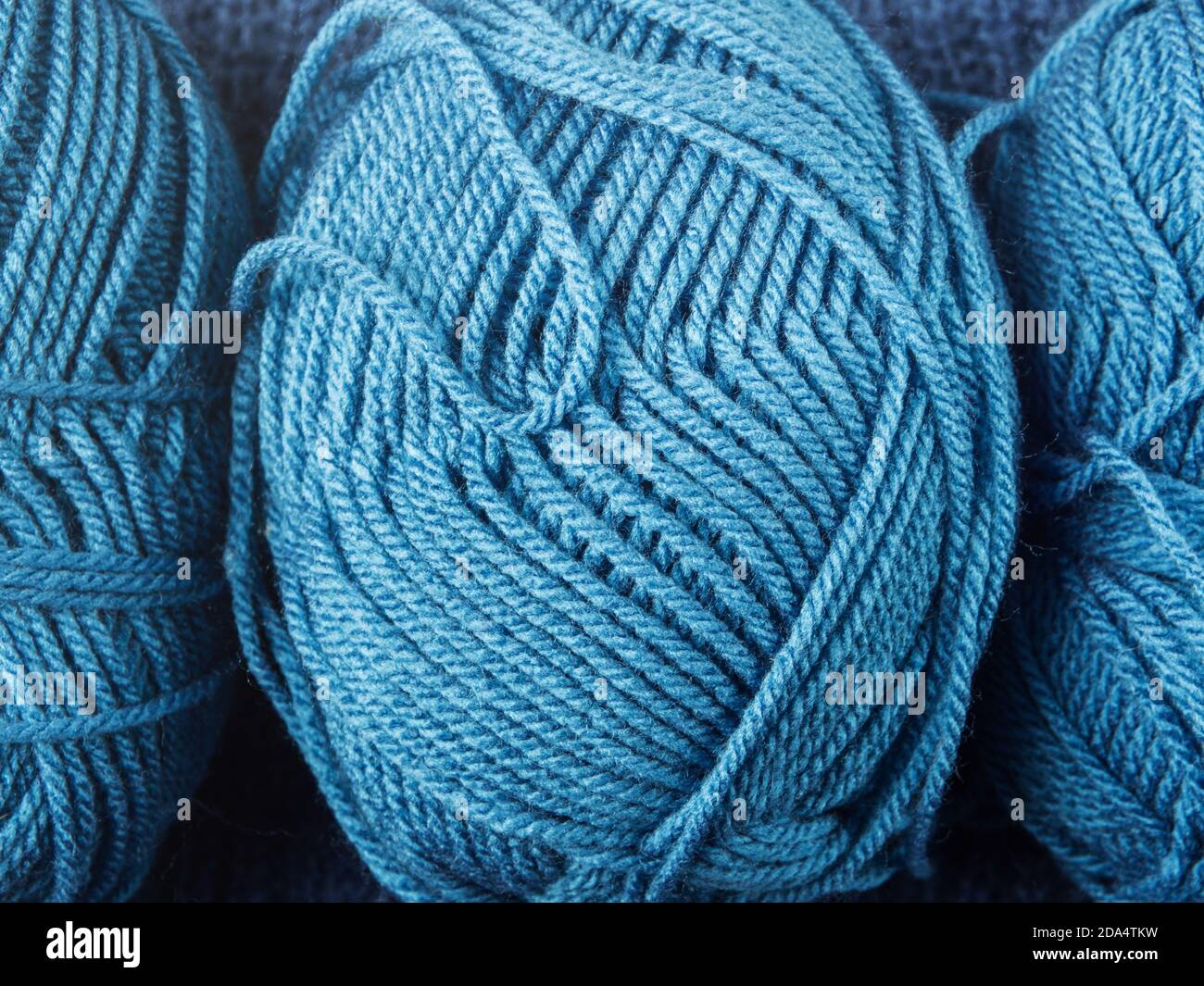 Soft Blue Woolen Yarn Isolated On White Top View Stock Photo