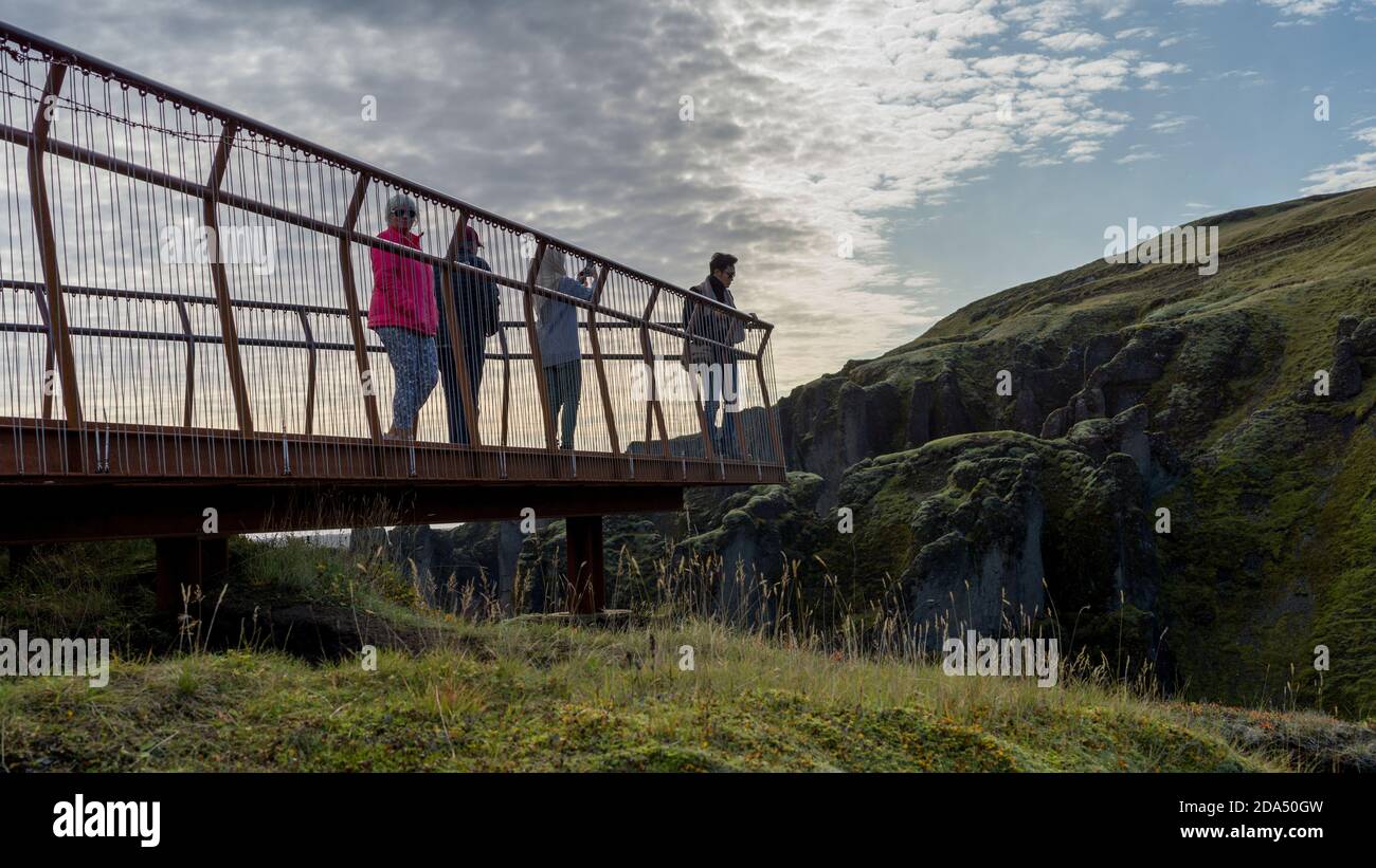 Tourists at Fjardarargljufur Canyon viewpoint, Skaftarhreppur