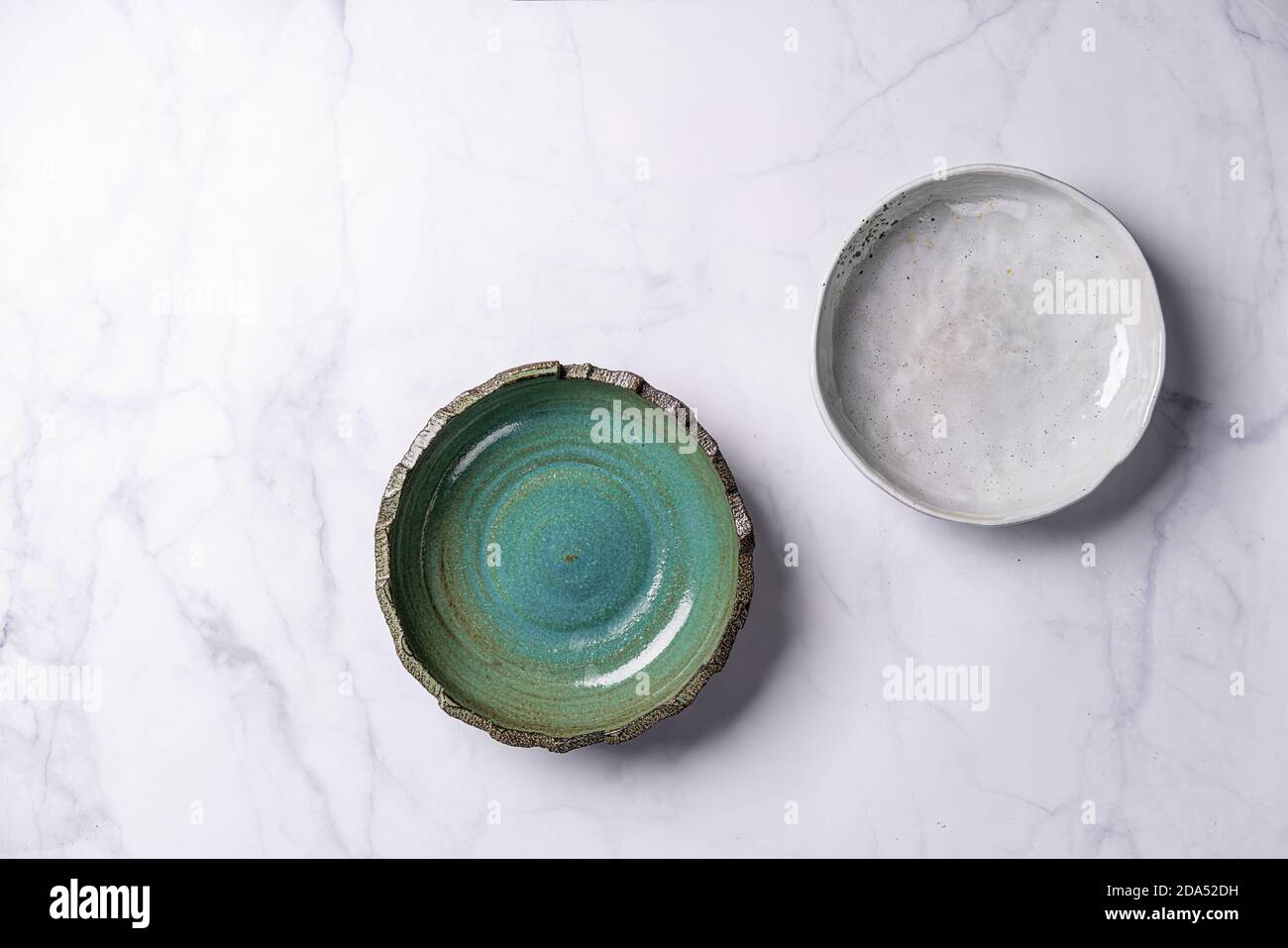 Two plates different size hi-res stock photography and images - Alamy