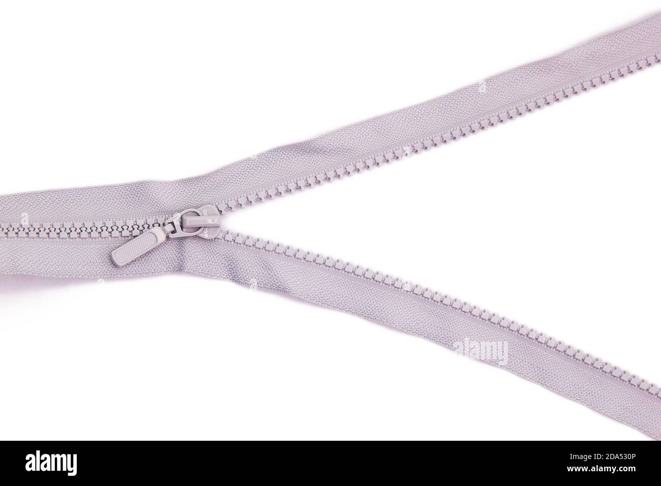 White zipper lock for jacket on white background isolate Stock Photo