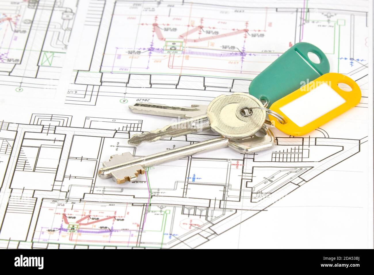 architectural drawings on a white sheet with keys to the house, the concept of construction and design of real estate Stock Photo