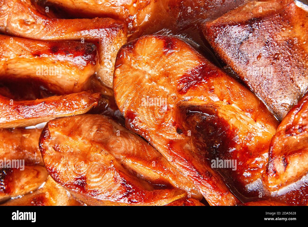 baked red fish in a marinade of teriyaki sauce Stock Photo