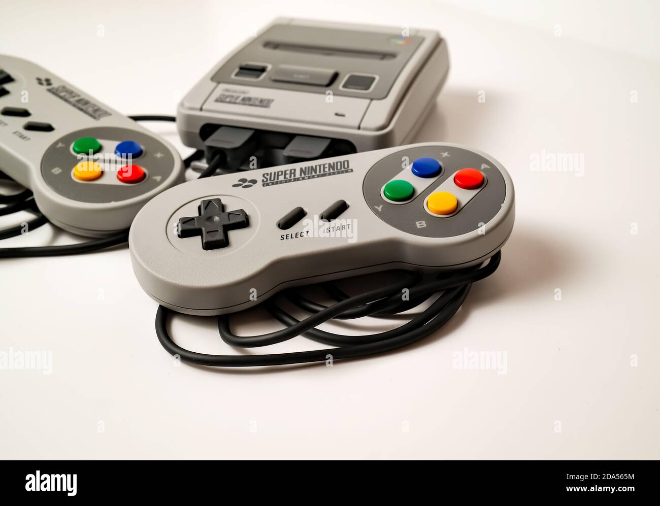 Norwich, Norfolk, UK – November 08 2020. Illustrative editorial photo of an all in one games console based on the retro Super Nintendo Entertainment S Stock Photo