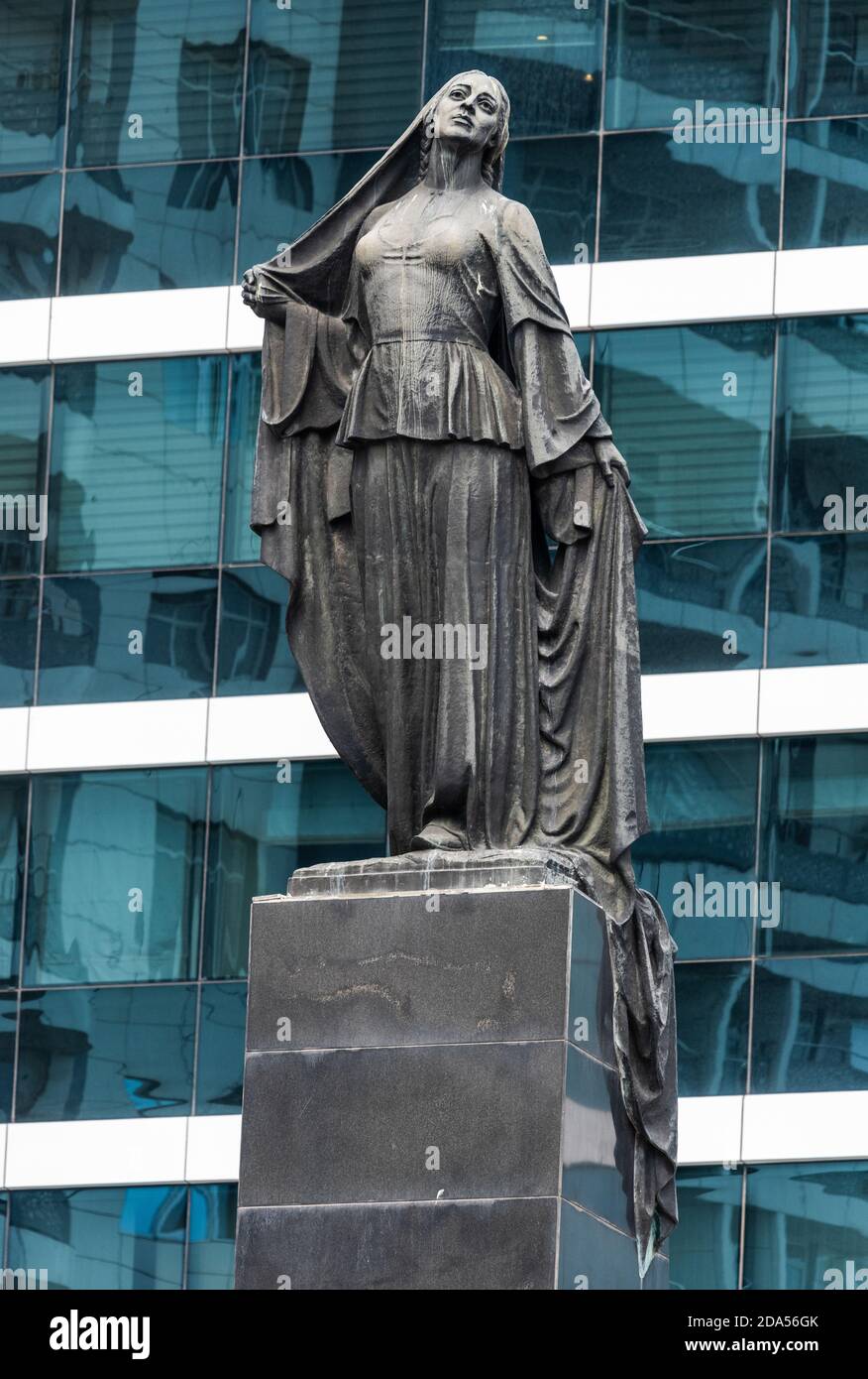 Baku, Azerbaijan – September 4, 2020.  Free Woman statue, depicting Azeri woman symbolically throwing off her hijab, in Baku, Azerbaijan. Located near Stock Photo