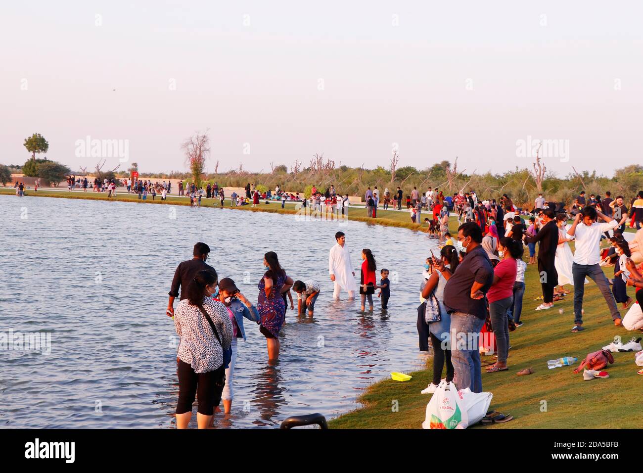 Dubai, United Arab Emirates - november 6, 2020 people are celebrating holidays at love lake, dubai Stock Photo