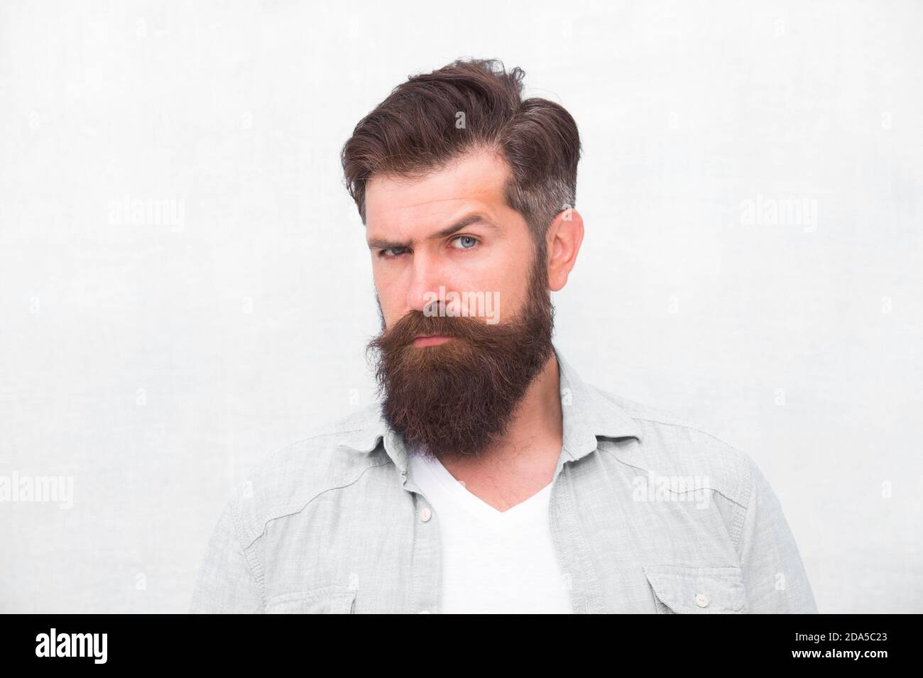 Got to shave. Male casual fashion style. Denim look. Mature hipster with  beard. barber care. brutal hipster with mustache. emit confidence.  barbershop professional. Bearded man seriously tuned Stock Photo - Alamy