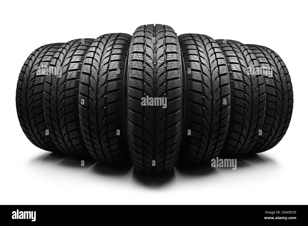 Row of car tires isolated on white background Stock Photo