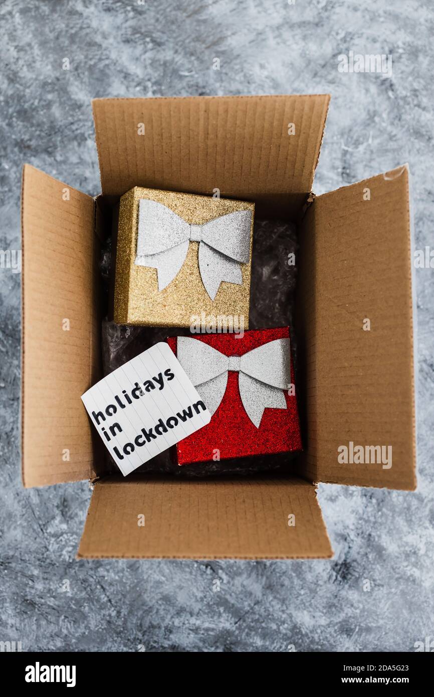 winter holidays in lockdown concept, gifts being delivered via postal
