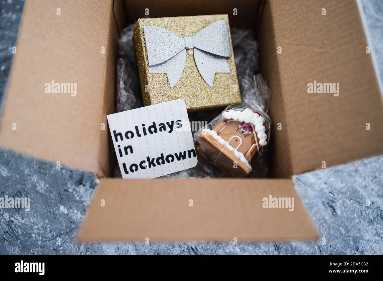 winter holidays in lockdown concept, gifts being delivered via postal