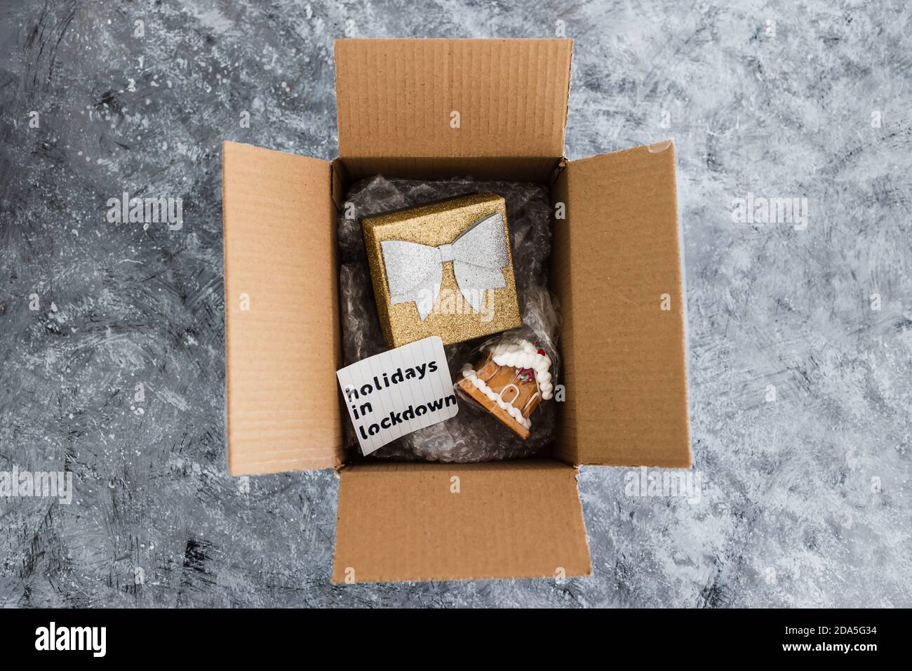winter holidays in lockdown concept, gifts being delivered via postal