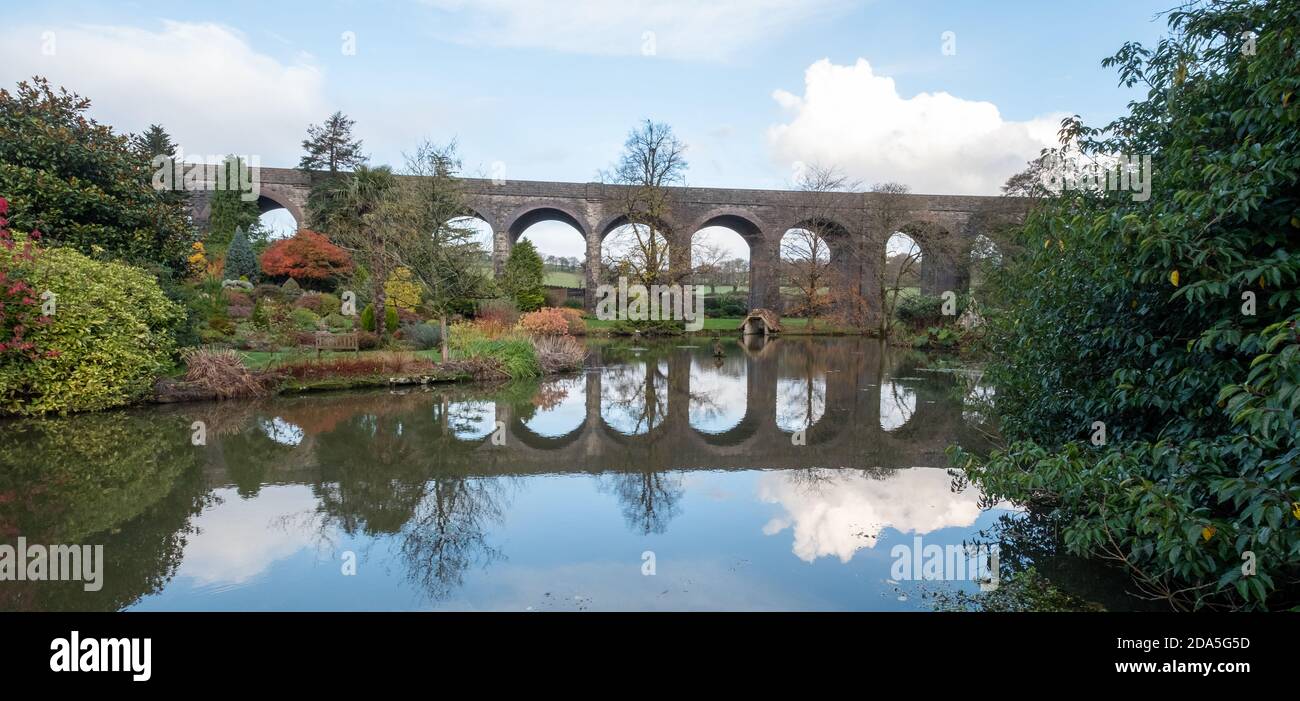 Kilver Court Gardens, historic garden located beneath disused Victorian viaduct, Charlton Viaduct, photographed in autumn with the leaves on the trees Stock Photo