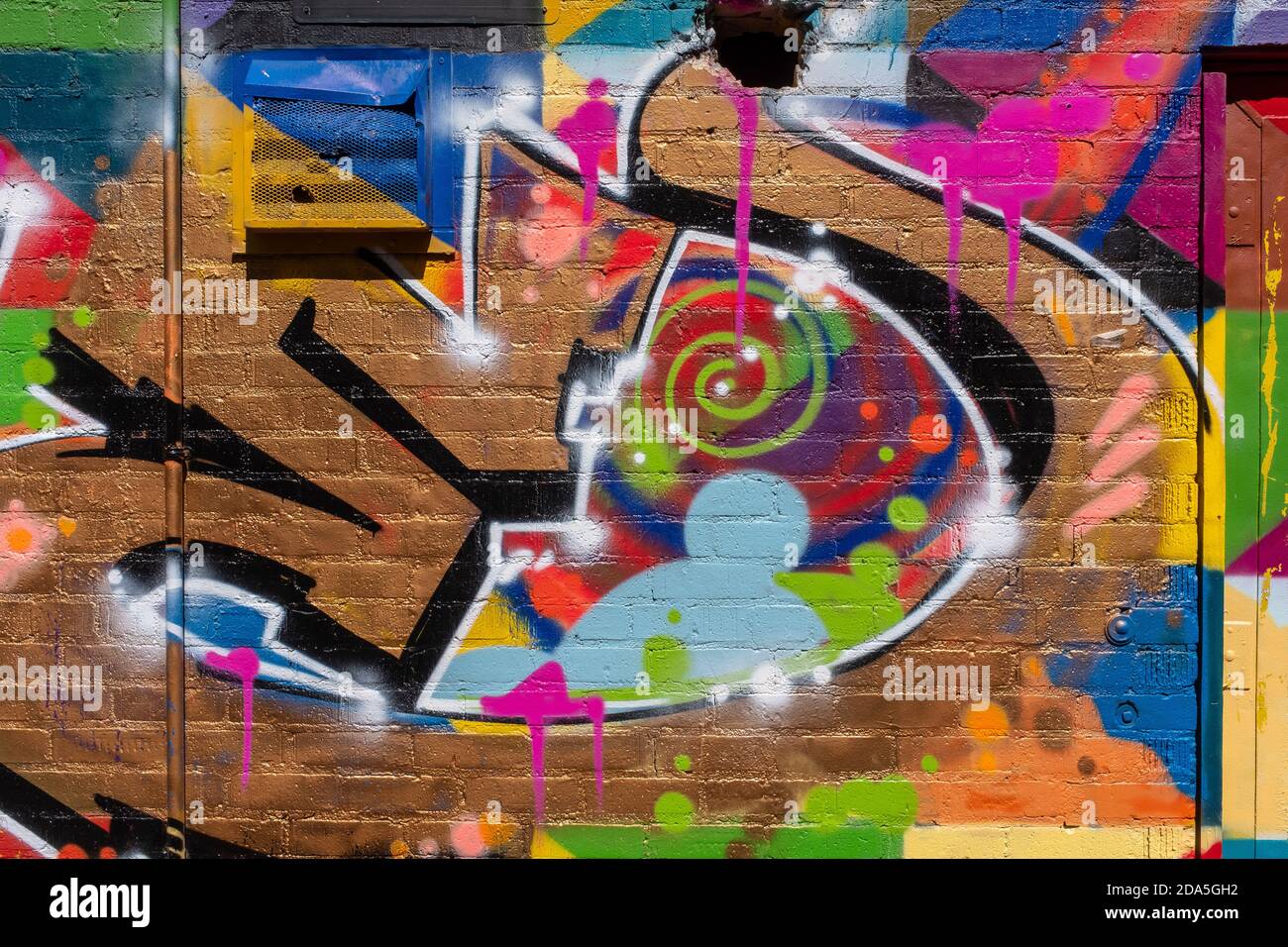 abstract graffiti in alley, downtown Albuquerque, New Mexico Stock Photo
