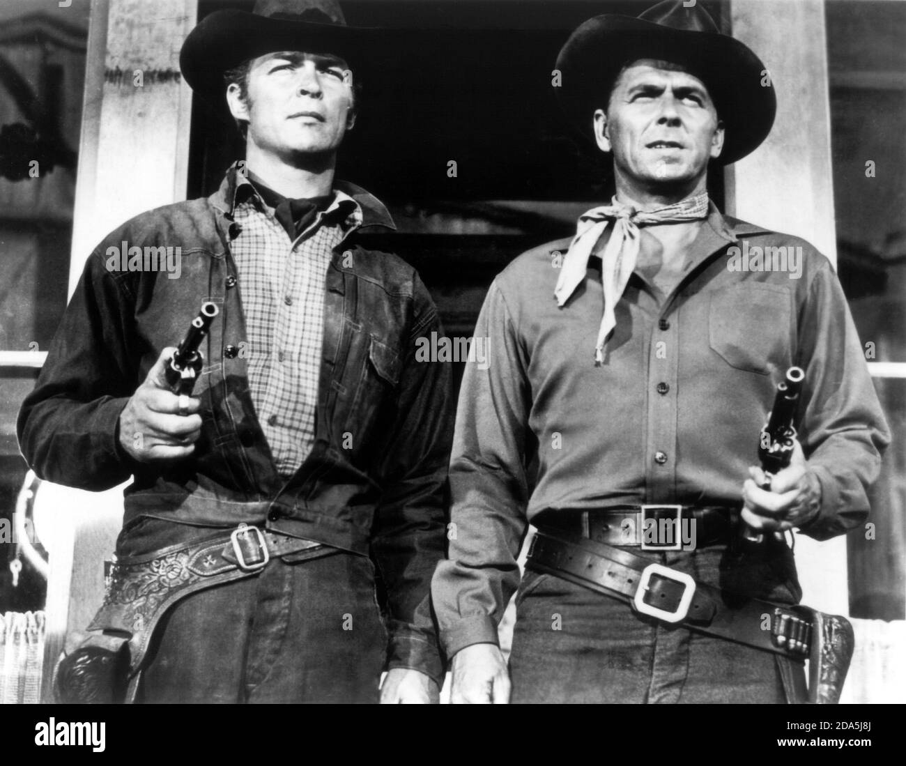 1957 , USA : CLINT EASTWOOD ( born in 1930 ) and RONALD REAGAN ( 1911 -  2004 ) in a episode of Western TV Show DEATH VALLEY DAYS . WESTERN -