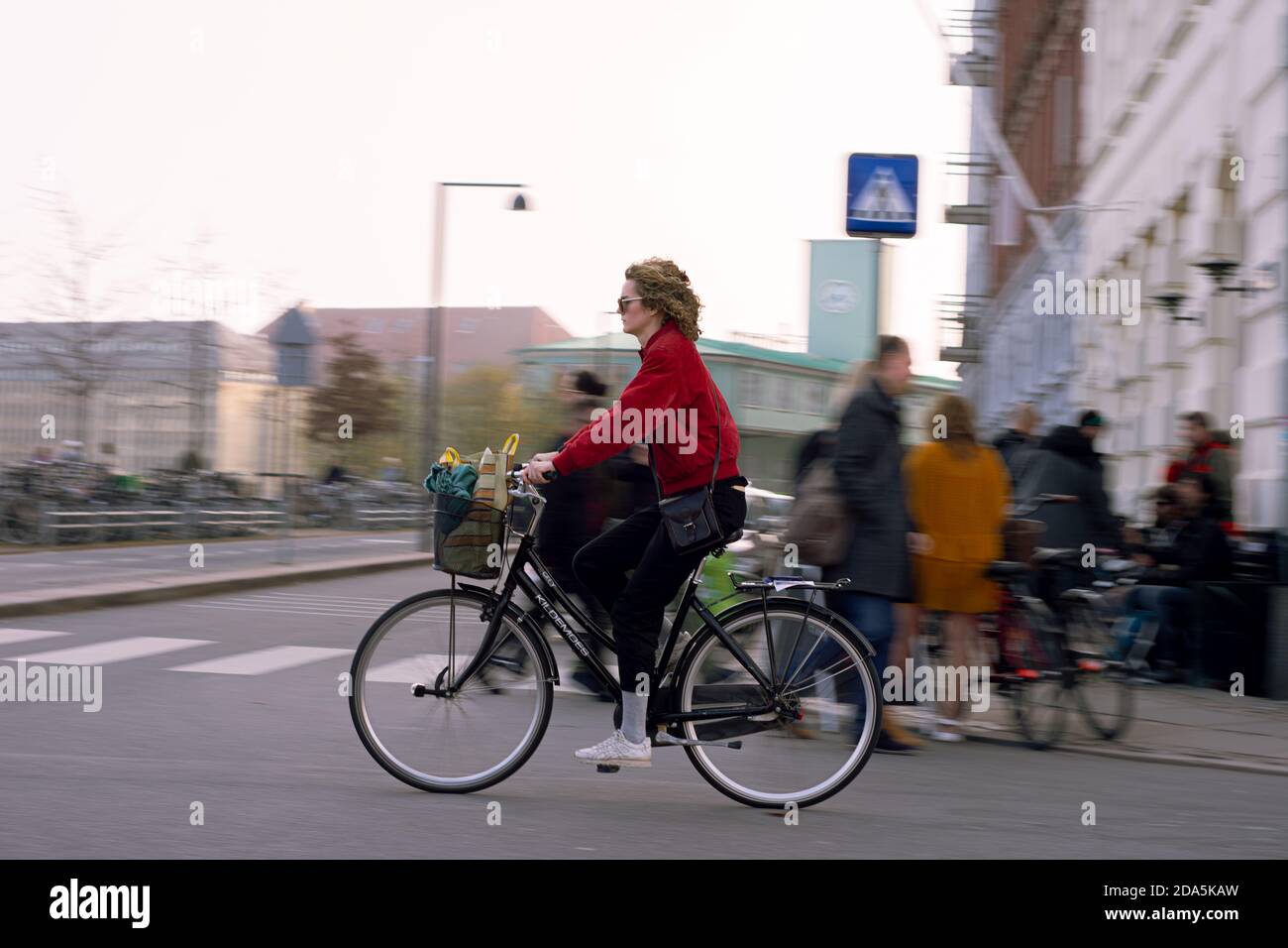 LIFE STYLE, STREET SCENE FROM COPENHAGUE. PEOPLE BIKING, DENMARK, MARCH 2019 Stock Photo