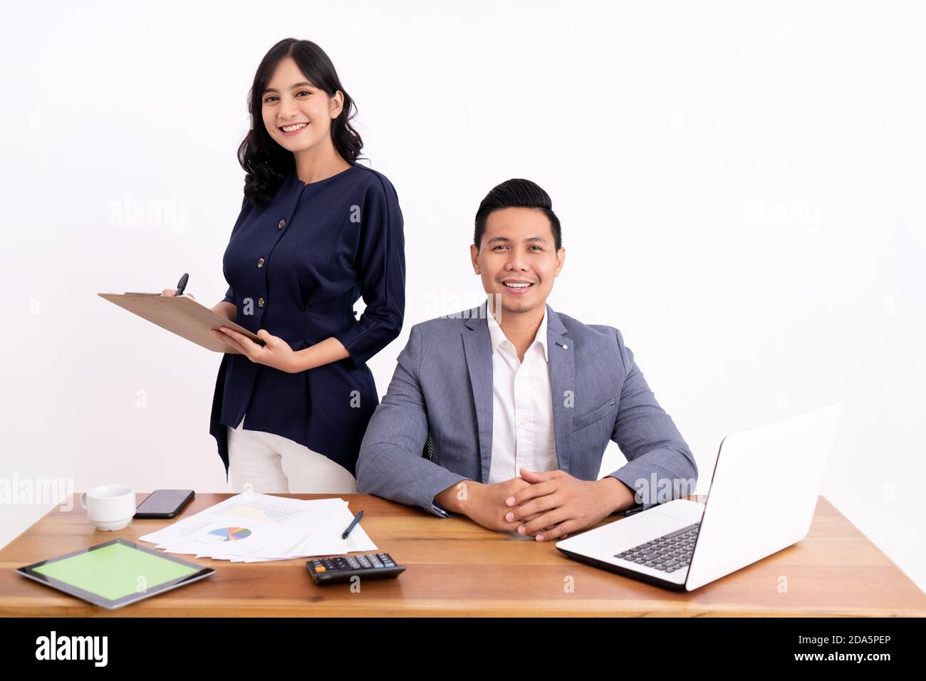 portrait of happy business partner working on modern office desk Stock ...