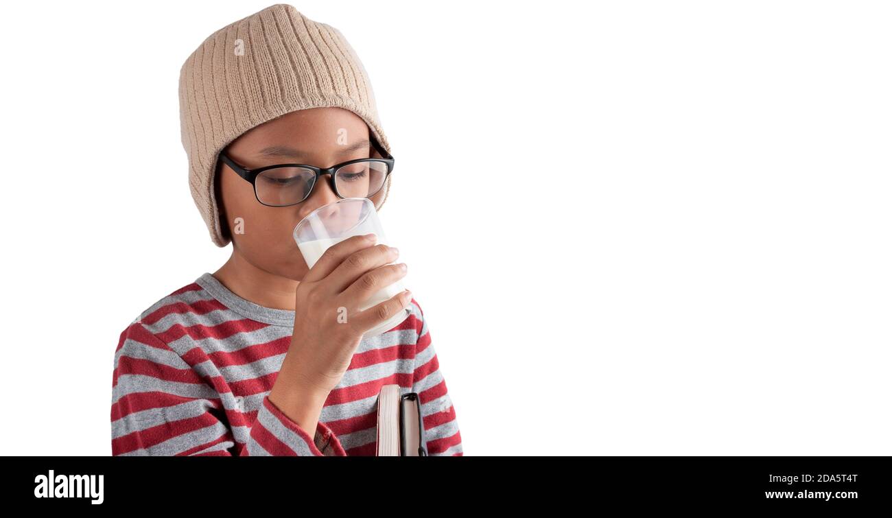 Boy in glasses drinking milk isolated on a white background Stock Photo