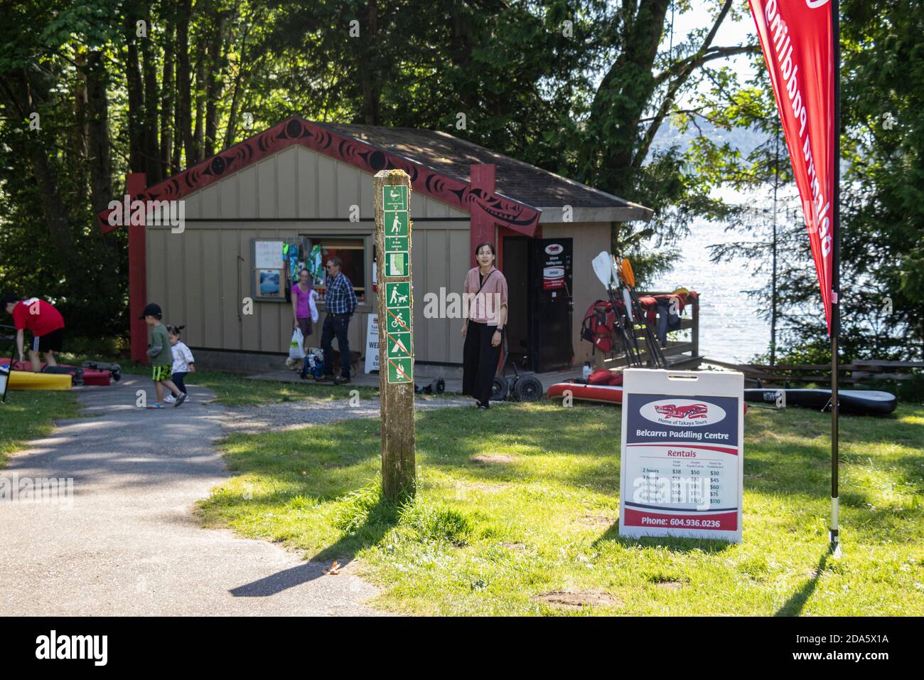 Belcarra, Canada - July 13,2020: View of information curb sign 'Belcarra Paddling Centre' with rental prices in Belcarra Regional Park Stock Photo