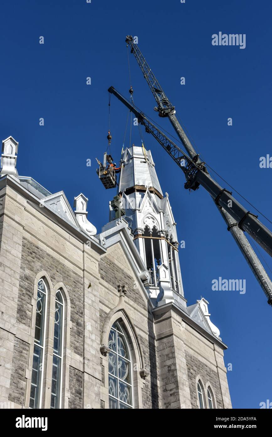 Repair of the steeple of the church of Saint-Pie in Quebec, Canada with ...