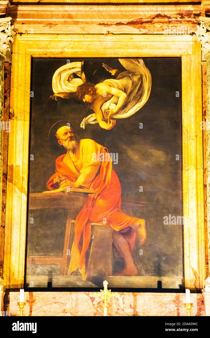 Caravaggio's painting The Inspiration of Saint Matthew hanging Church of Saint Louis of the French in Rome Italy Stock Photo