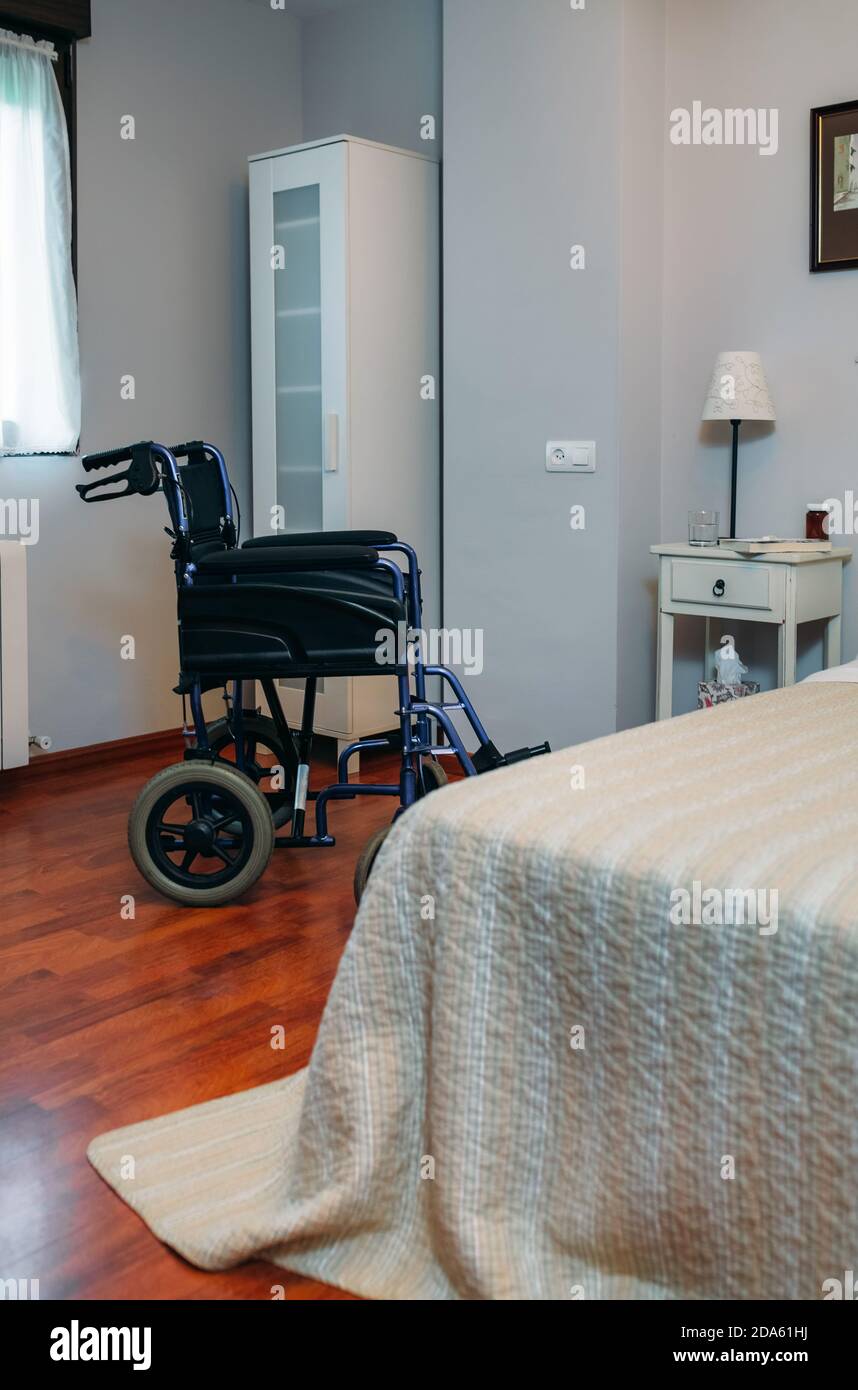 Clinic room with wheelchair Stock Photo Alamy