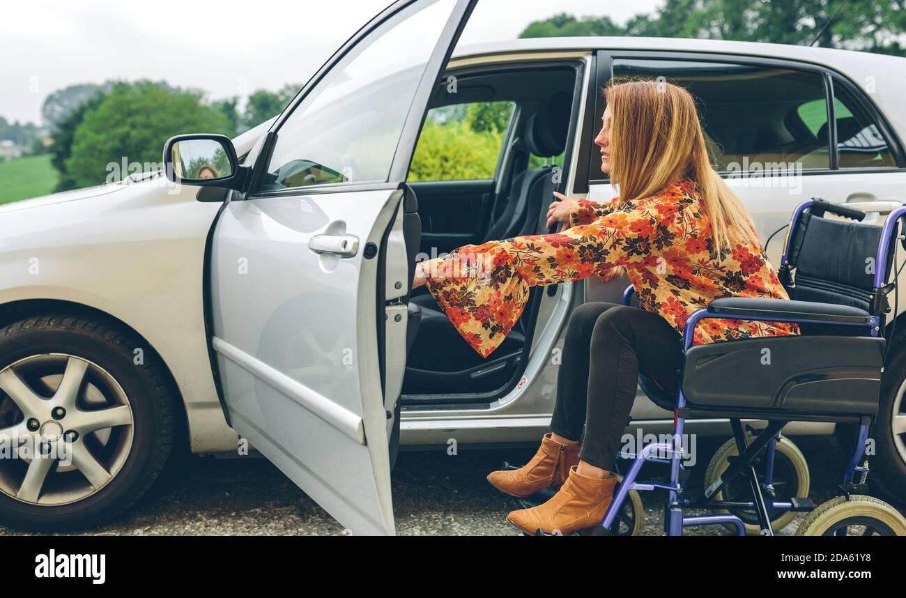 Disabled young woman in wheelchair hi-res stock photography and images ...