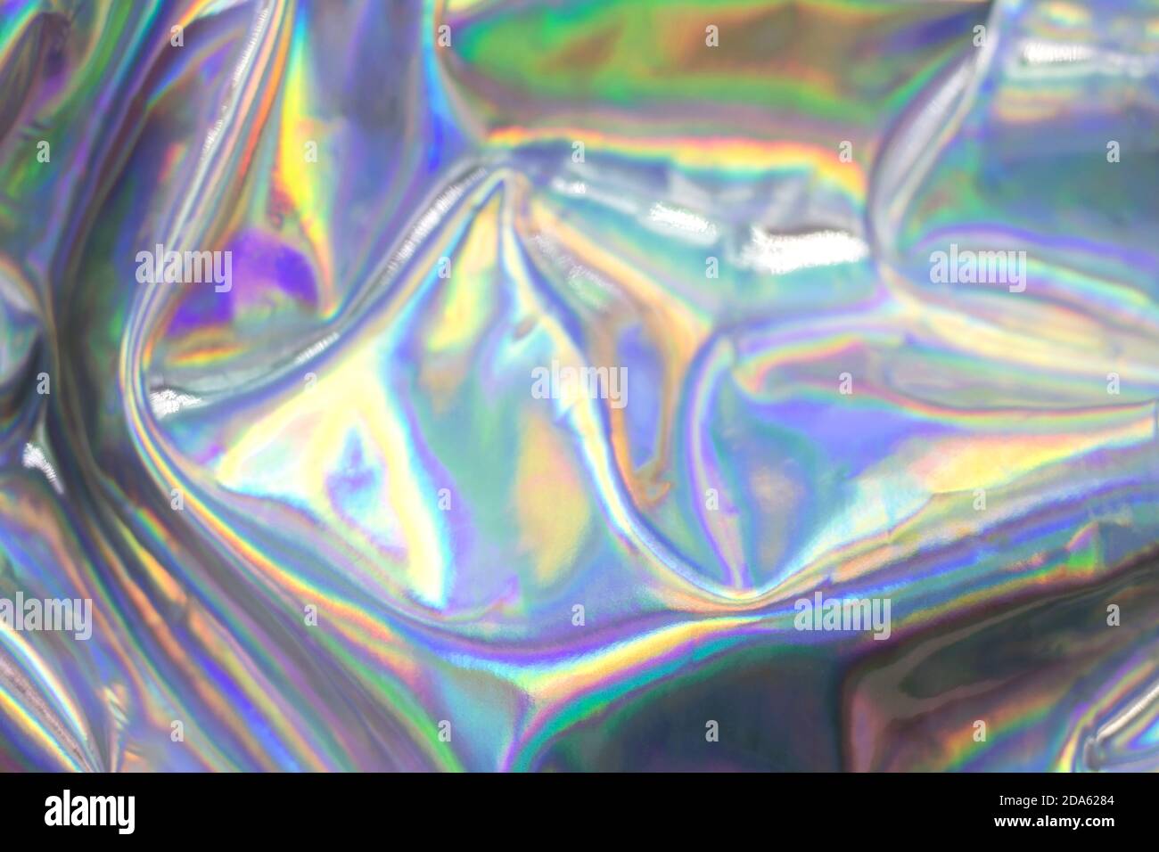 Holographic iridescent abstract blurred surface. Holographic gradient. Stock Photo