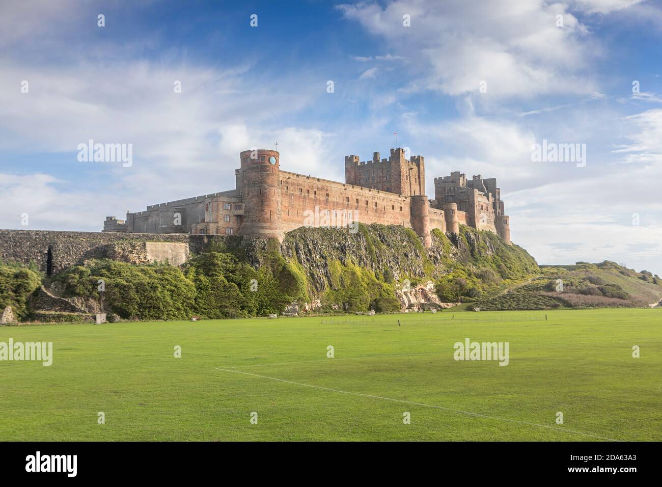 Bamburgh Castle from Bamburgh Cricket Pitch. Stock Photo