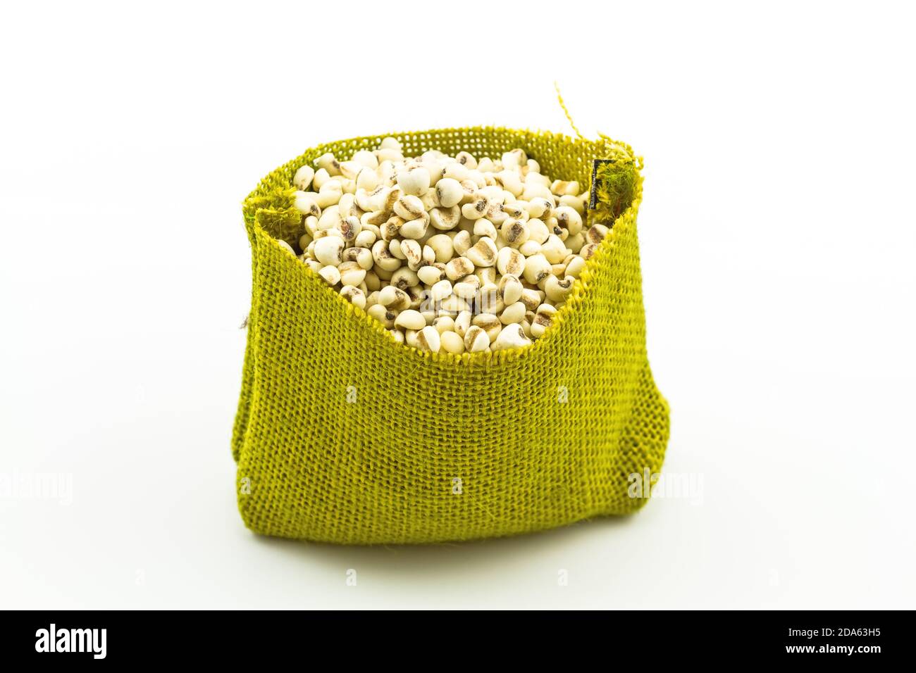 millet rice in green sisal sack on white background Stock Photo - Alamy