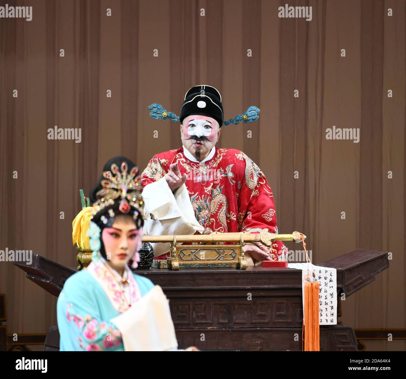 Nanjing, Nanjing, China. 9th Nov, 2020. CHINA-A new classic comedy, ''Xu Jiujing's Promotion''(), performed by Hubei Provincial Peking Opera Theatre at the Zijin Beijing-Kunming Art Festival in Nanjing, capital of East China's Jiangsu Province, Nov. 9, 2020.In September 1980, The Promotion of Xu Jiujing was created by Hubei Peking Opera House and performed in 1981.From 1980 to 1981, the drama won the ''National Opera Excellent Script Award'', and created a memorable image of Xu Jiujing, a typical good official. Credit: SIPA Asia/ZUMA Wire/Alamy Live News Stock Photo