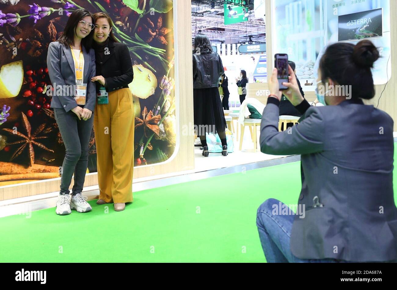 Shanghai, China. 10th Nov, 2020. People take photos at the Medical Equipment and Healthcare Products exhibition area during the third China International Import Expo (CIIE) in Shanghai, east China, Nov. 10, 2020. The expo is scheduled to run till Nov. 10. Staff members, exhibitors and visitors take photos to keep precious moments of the event. Credit: Zhang Yuwei/Xinhua/Alamy Live News Stock Photo