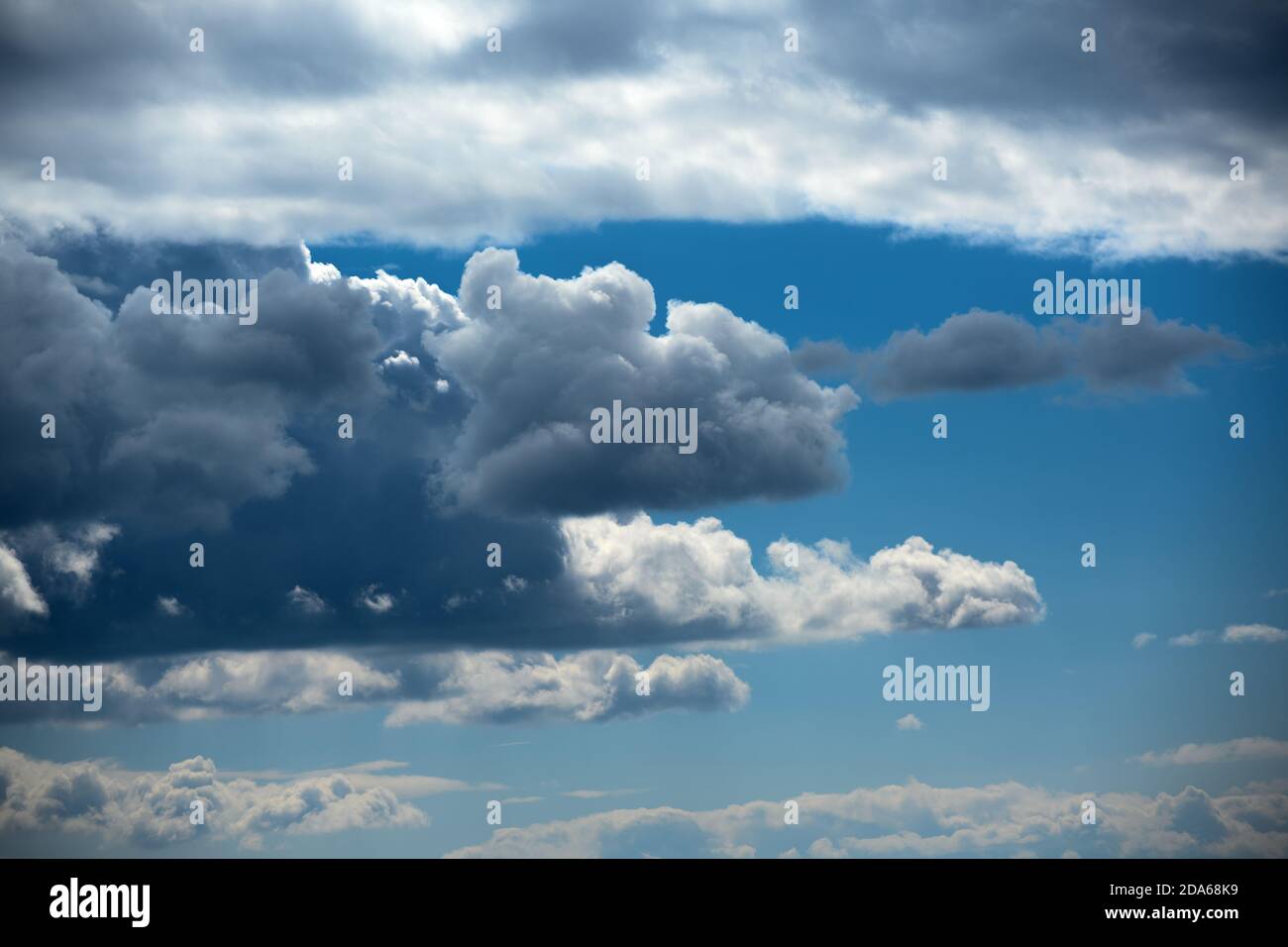 Beautiful blue sky with clouds. Natural background Stock Photo - Alamy