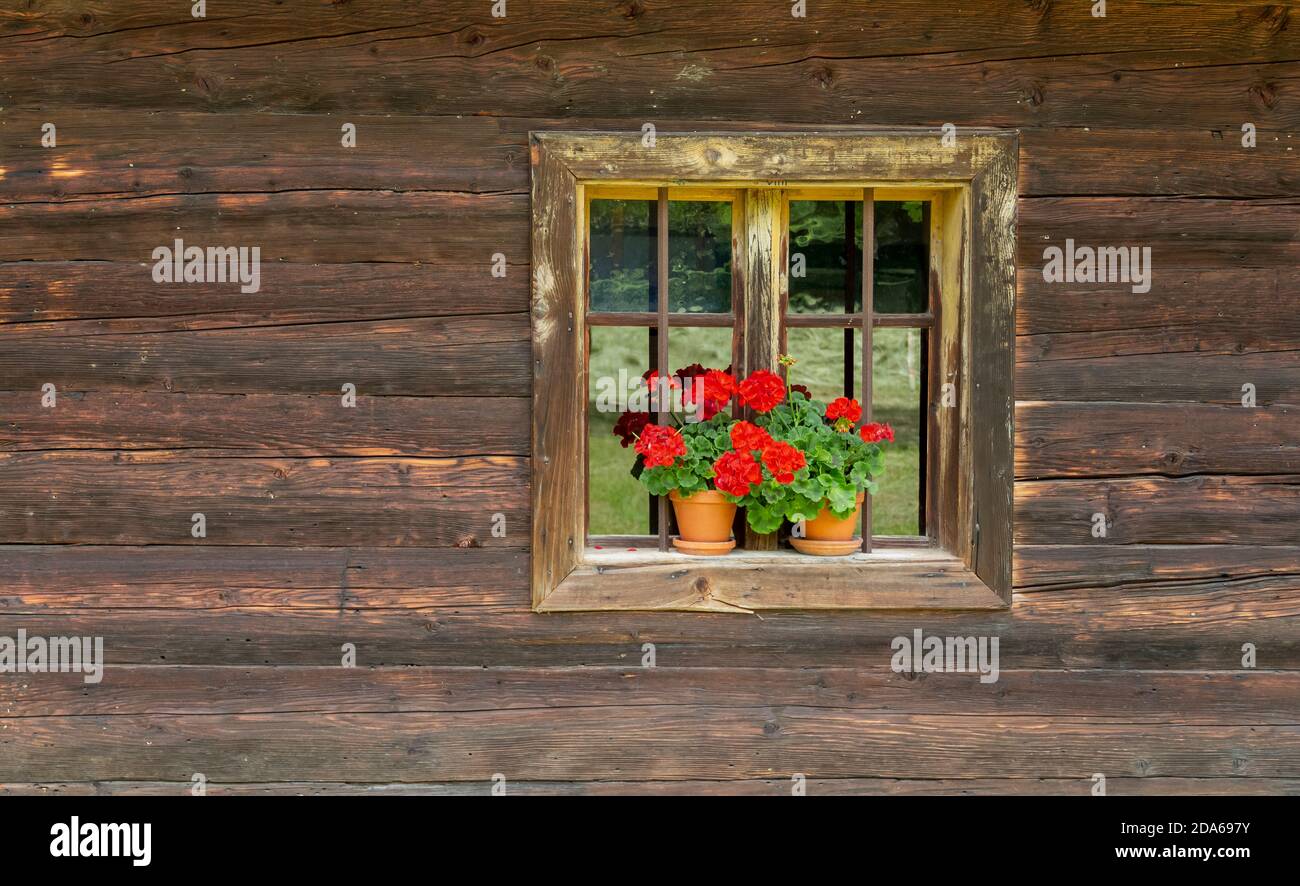 window in a rustic wooden brown house facade Stock Photo - Alamy
