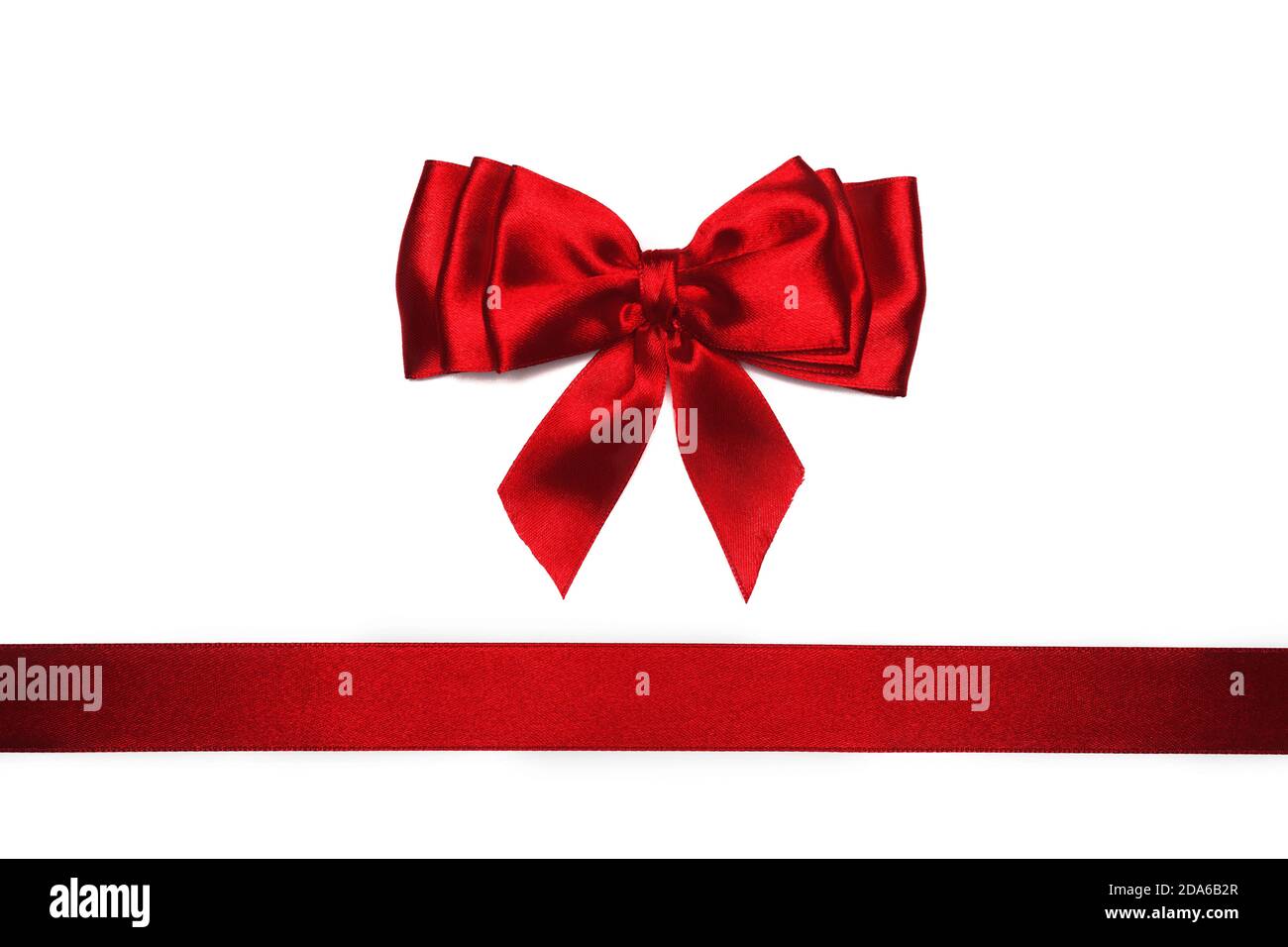 Red satin bow and ribbon on white background Stock Photo