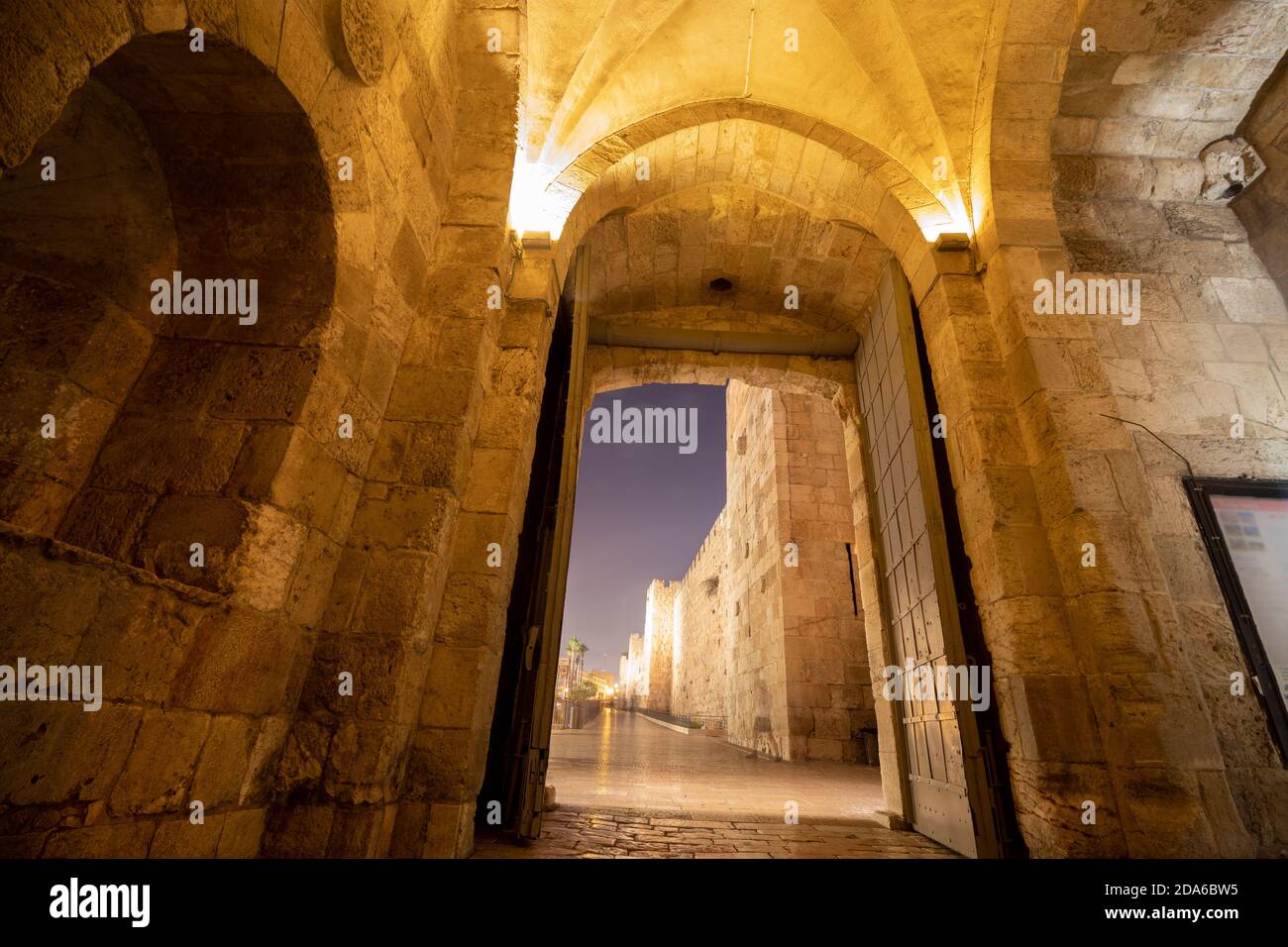Jaffa Gate in the walls of the Old City of Jerusalem at night, view from inside the wall Stock Photo