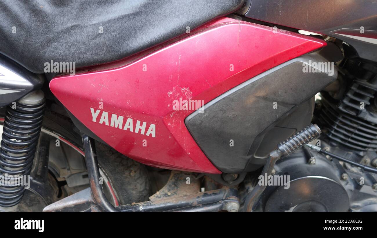 02 November 2020 : Reengus, Jaipur, India / Side panel of Yamaha motorcycle. Stock Photo