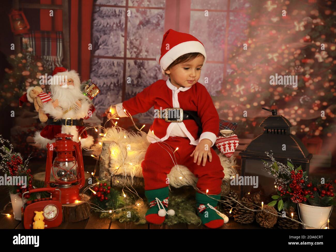 Child in Santa Claus costume, Christmas, Happy New Year 2021 Stock Photo