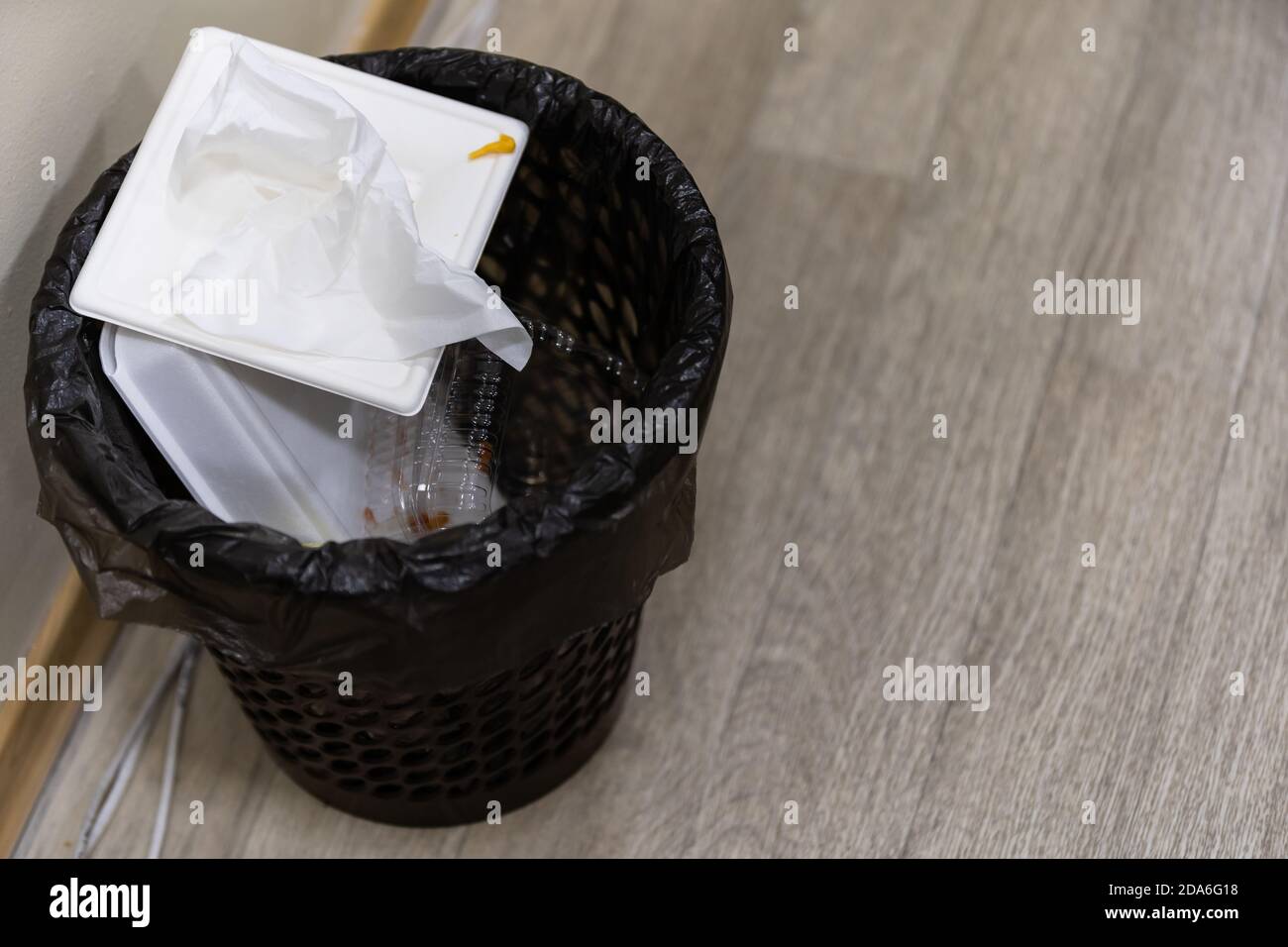 Black garbage recycle bin with plastic containers Stock Photo Alamy
