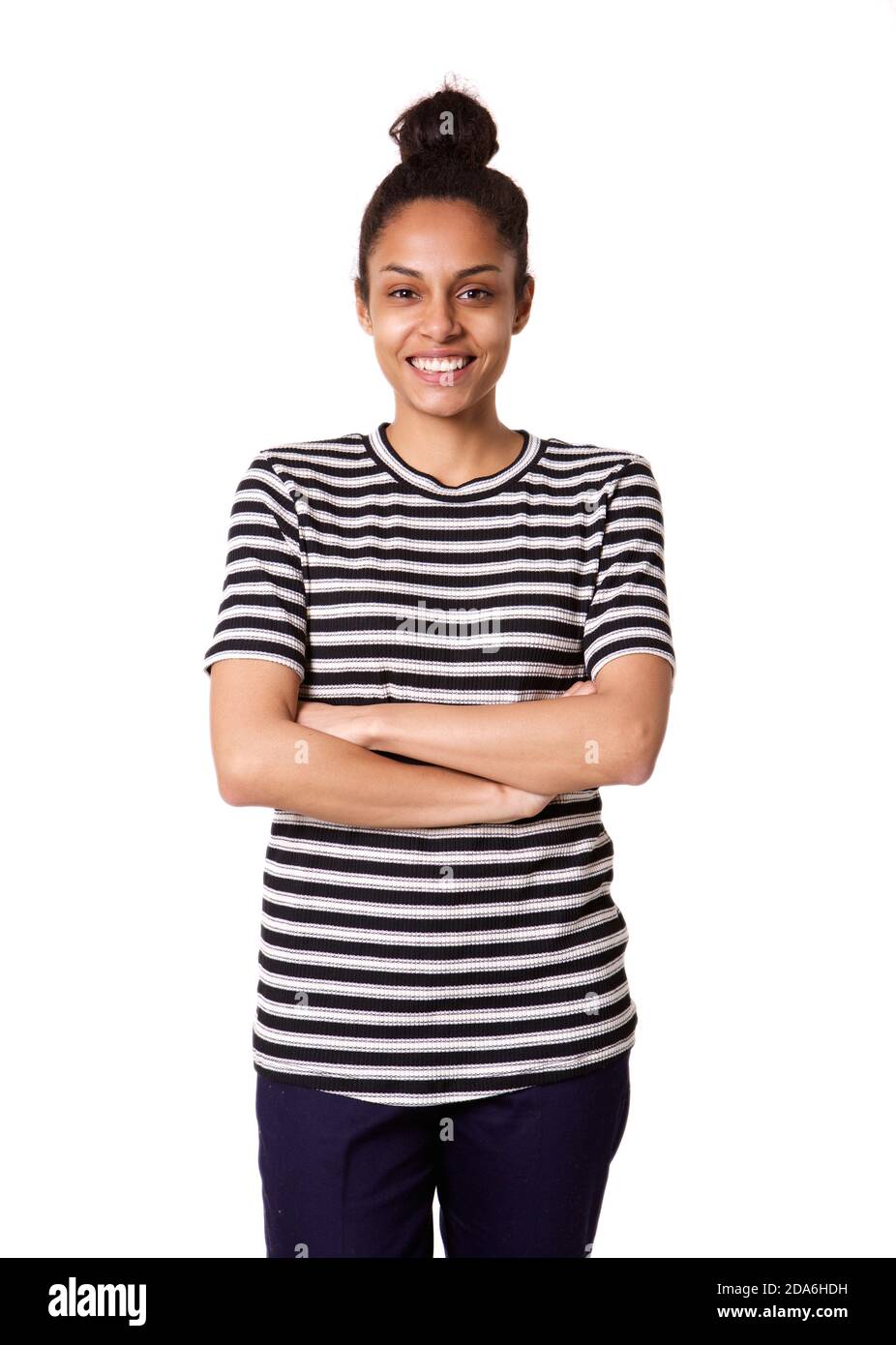 Portrait of confident young african lady standing with her arms crossed ...