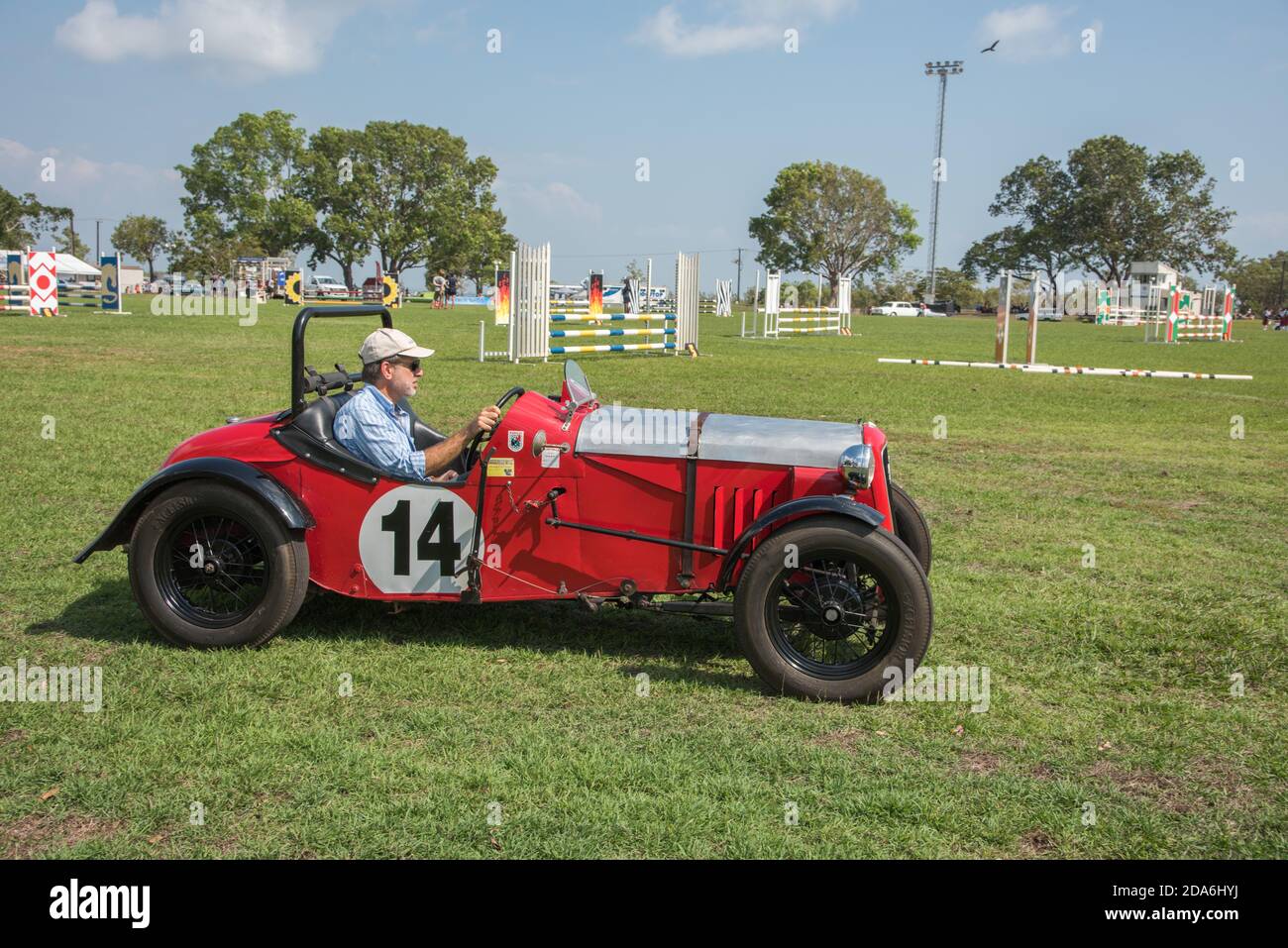 Darwin, NT, AustraliaJuly 27,2018 Vintage car parade with old racer with roller and driver at
